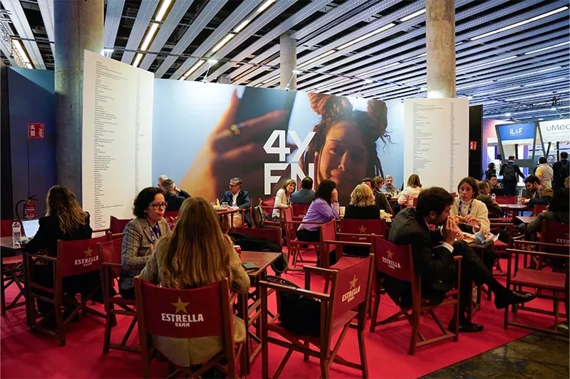 Attendees engaging in discussions about global startup ecosystems at 4YFN, showcasing the event's inclusive and innovative spirit