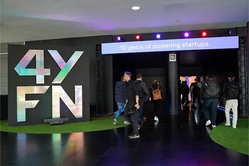 Dynamic graphic showcasing the tagline 'Where startups grow up,' emphasizing innovation and entrepreneurship at the 4YFN event in partnership with MWC Barcelona